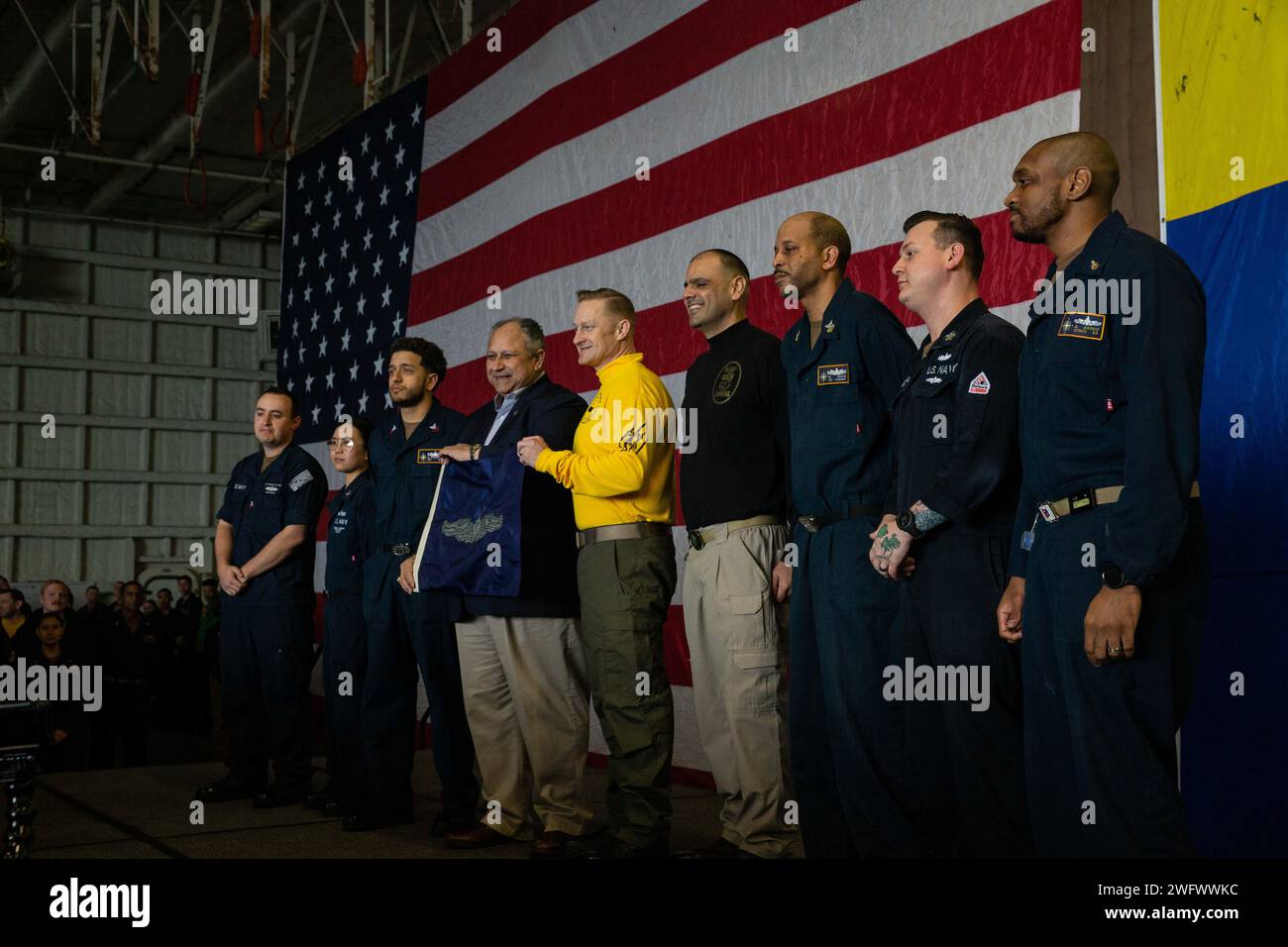 240114-N-IQ220-4153 Secretary of the Navy Carlos Del Toro, center ...
