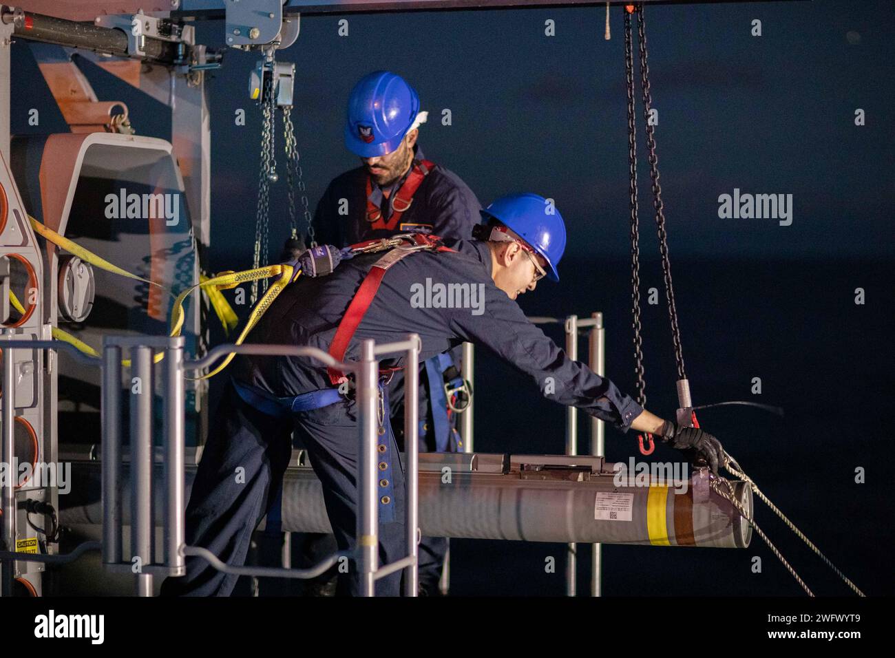 Fire Controlman 2nd Class Anthony Reyes, left, and Fire Controlman 2nd ...