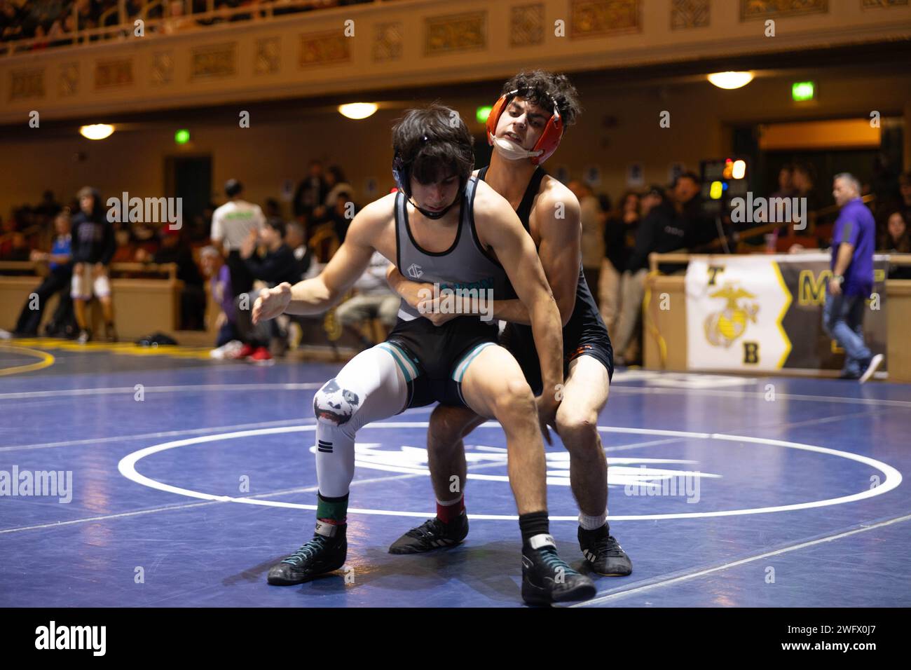 Two wrestlers compete during the Tim Brown Memorial Wrestling Tournament at the Sacramento Memorial Auditorium in Sacramento, Calif. on Jan. 13, 2024. The annual Tim Brown Memorial Wrestling Tournament is held for California High Schools to compete, and to honor fallen Marine and Foothill High School wrestler alumn, Lance Cpl. Timothy Brown, who was killed in action in Anbar Province, Iraq on Nov. 14, 2006. Stock Photo