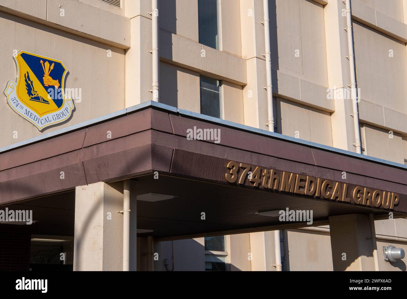 The entrance of the 374th Medical Group (MDG) building at Yokota Air Base, Japan, Jan. 9, 2024. The Department of Defense’s new electronic health record, MHS GENESIS, launched at the 374th MDG on Oct. 28, 2023, replacing TRICARE Online. Stock Photo