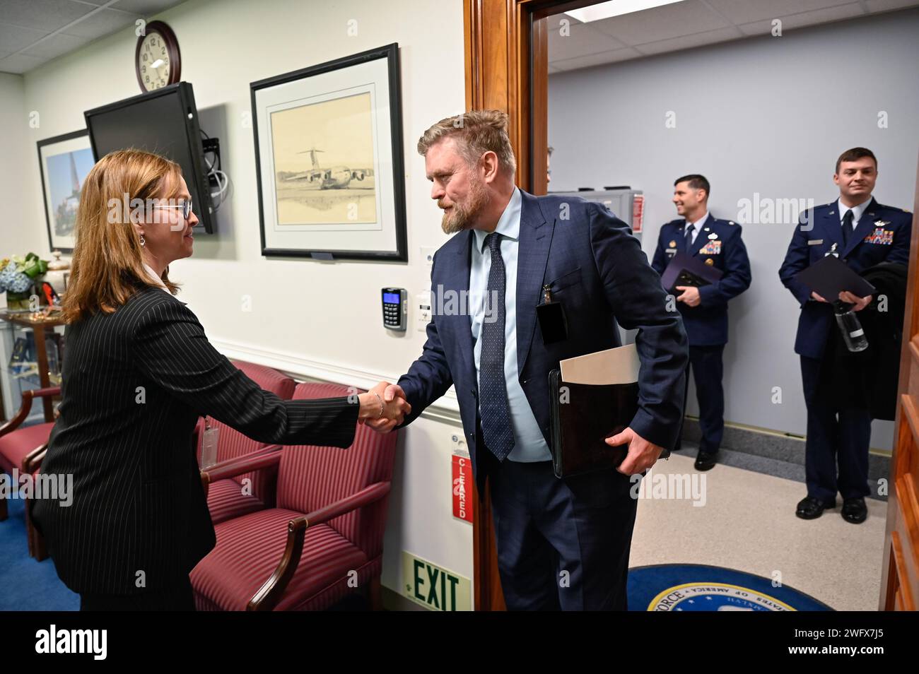 Kelli Seybolt, deputy undersecretary of the Air Force for international affairs, greets Iceland Chief of Defence Jónas Allansson before a meeting at the Pentagon, Arlington, Va., Jan. 22, 2024. This image has been altered to obscure security badges. Stock Photo