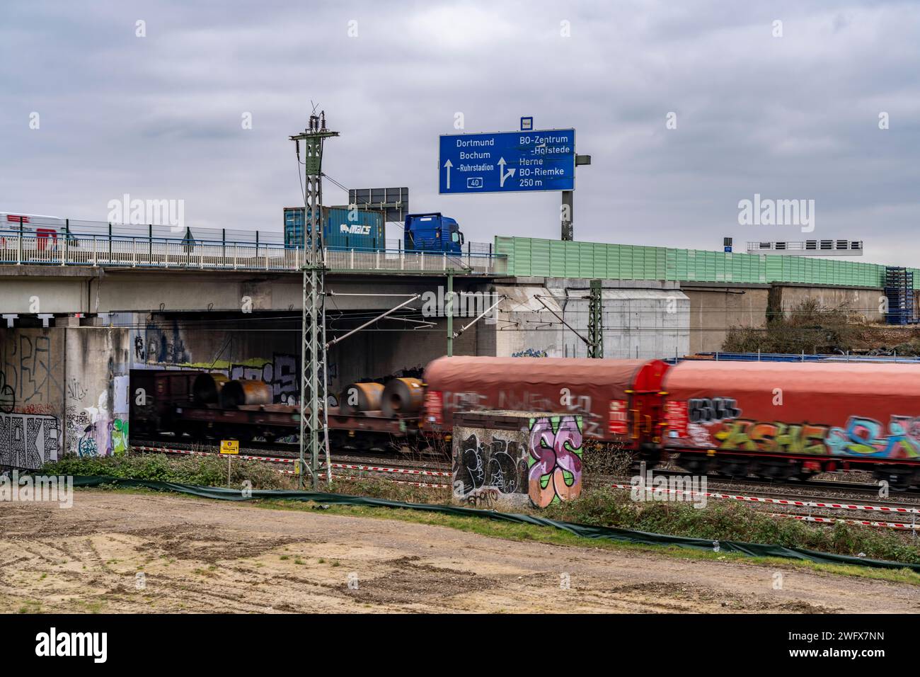 Freeway bridge of the A40, over a 3-track railroad line, between Bochum ...