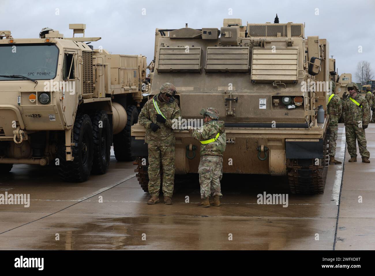 Soldiers from the 75th Field Artillery Brigade; the 2nd Battalion, 18th ...