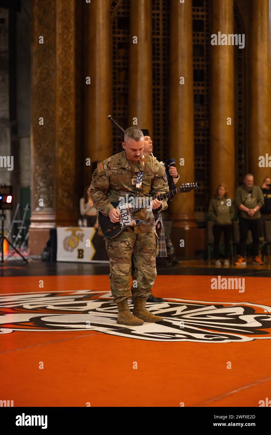 U.S. Army Sgt. 1st Class, Matthew Hart, performs the National Anthem