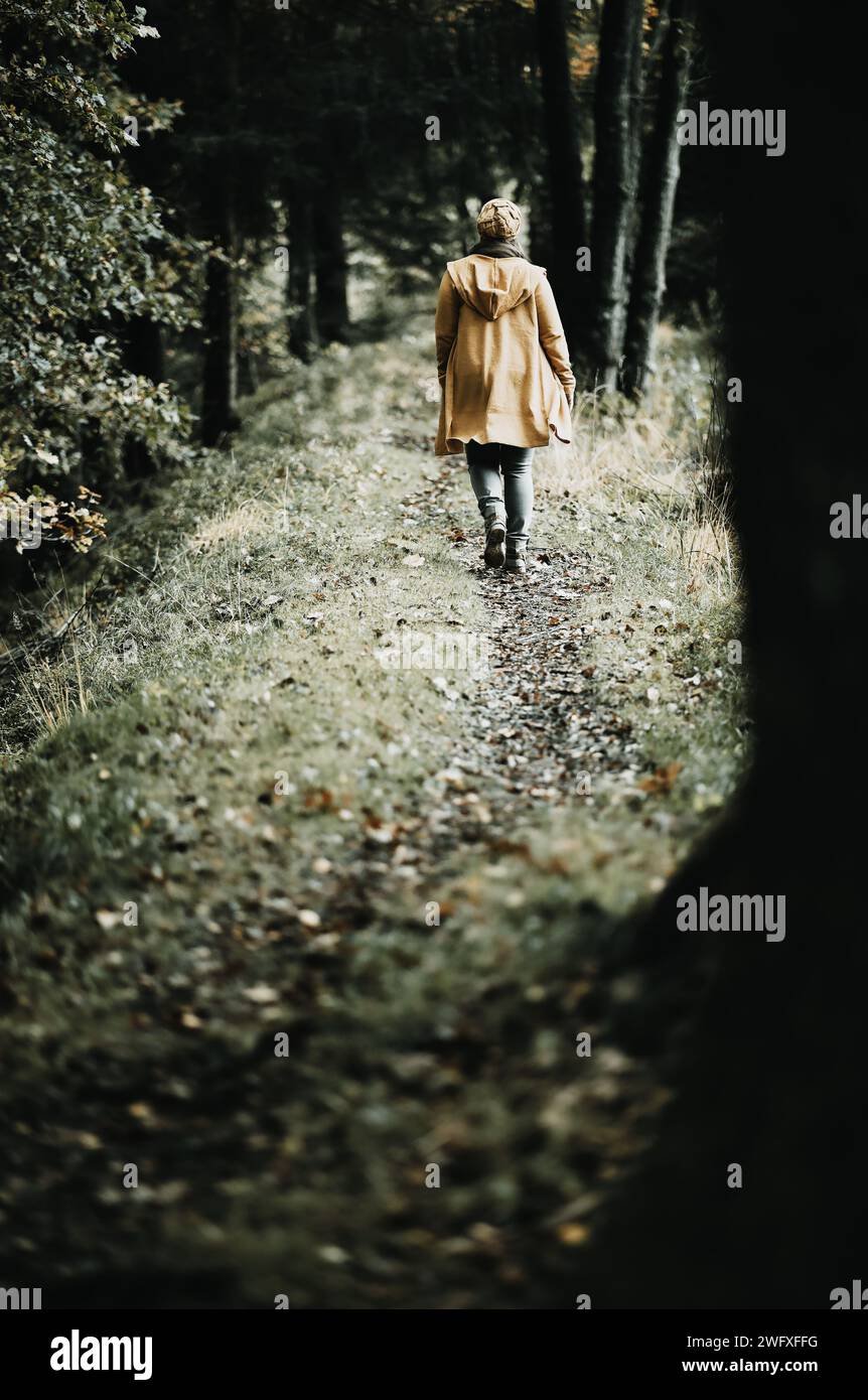 Young woman walks along abandoned hi-res stock photography and images ...