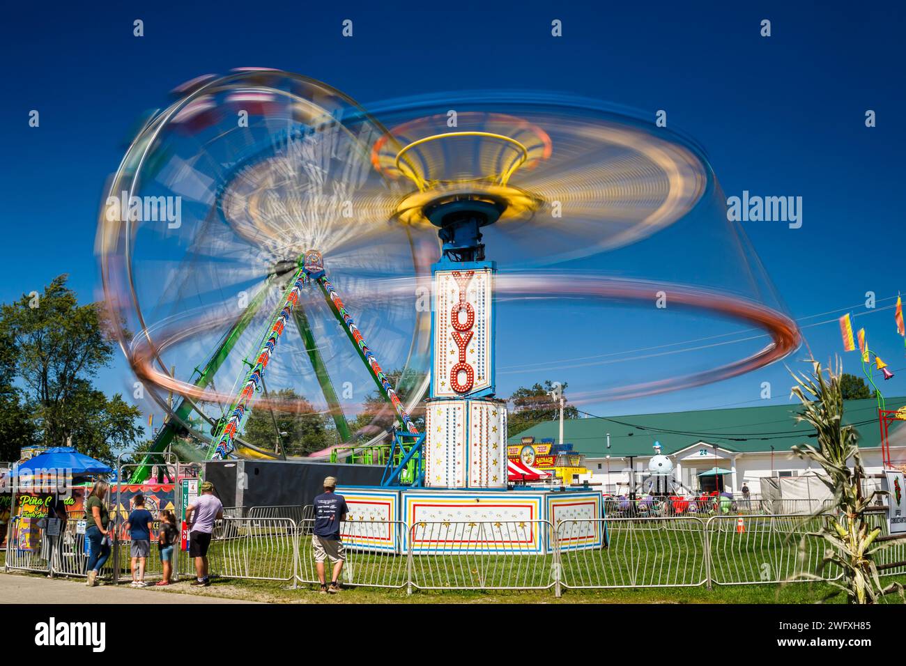 Carnival Ride with long exposure motion blur. Canfield Fair, Mahoning County Fair, Canfield, Youngstown, Ohio, USA. Stock Photo