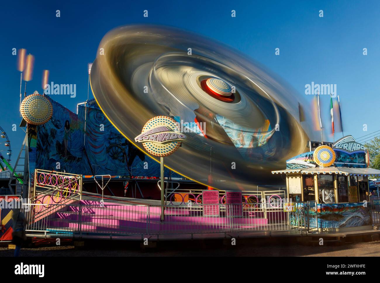 Tornado Carnival Ride with long exposure motion blur. Canfield Fair, Mahoning County Fair, Canfield, Youngstown, Ohio, USA. Stock Photo