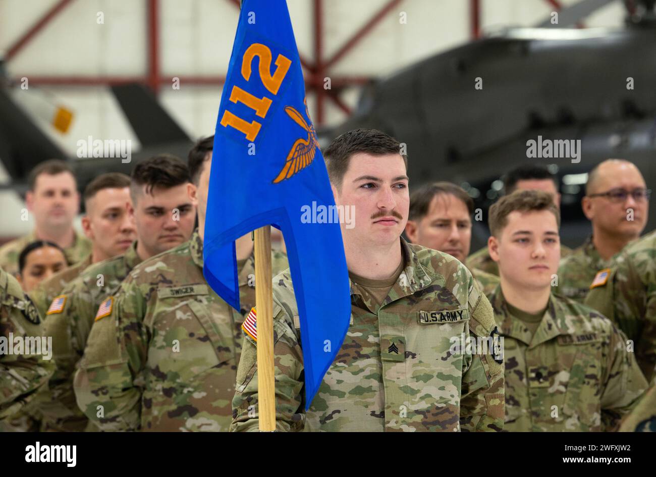 Oregon Army National Guard Soldiers assigned to Detachment 1, Company Alpha, 1st Battalion – 112th Aviation listen to remarks during their Demobilization Ceremony held at the Army Aviation Support Facility at Salem, Oregon on Jan. 19, 2024. A total of 27 Oregon Army National Guard Soldiers teamed-up with Soldiers from Idaho, North Dakota, Montana and Wisconsin as part of a 12 month mobilization along the U.S. Southwest Border. (National Guard Stock Photo