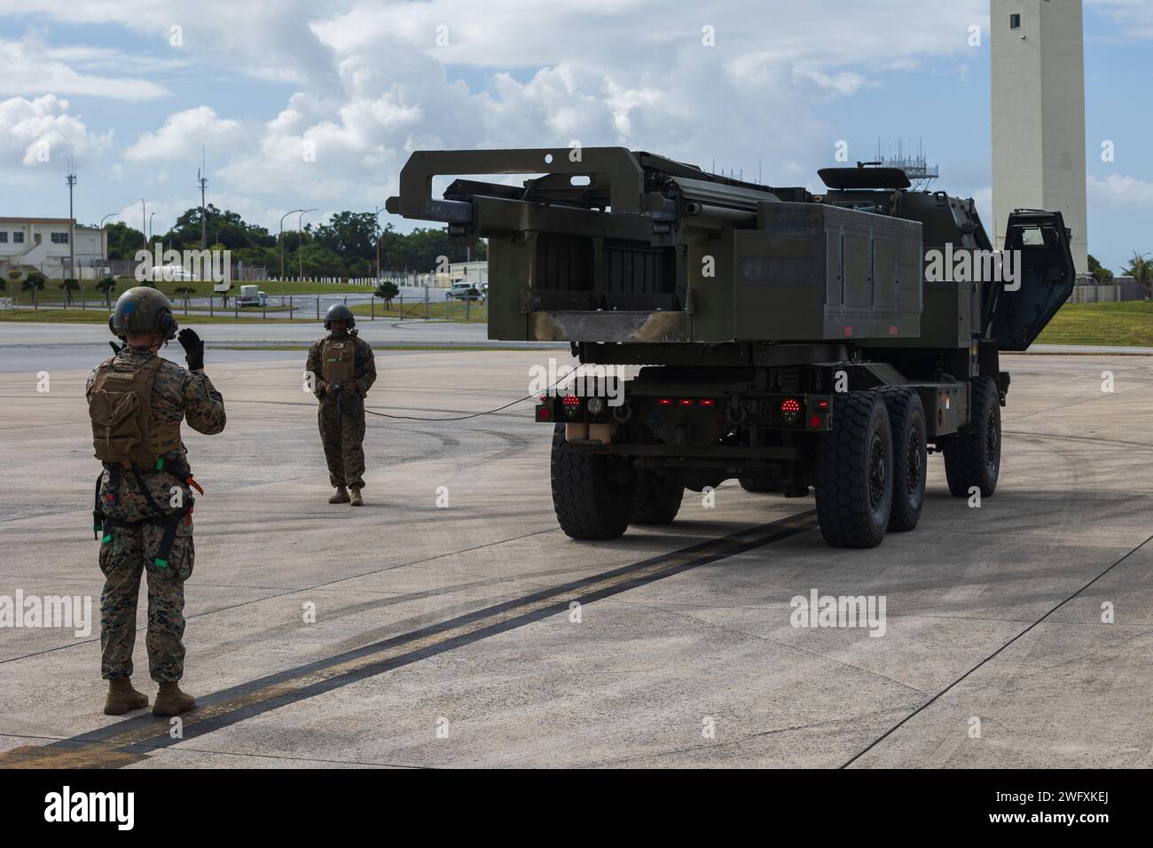 U.S. Marines direct a High Mobility Artillery Rocket System during a ...