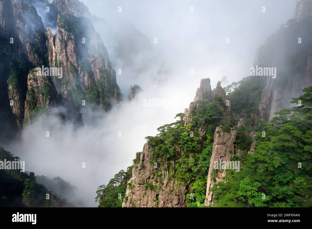 The Sea of Clouds floats amidst the North Sea area of Huangshan Yellow Mountains. Stock Photo