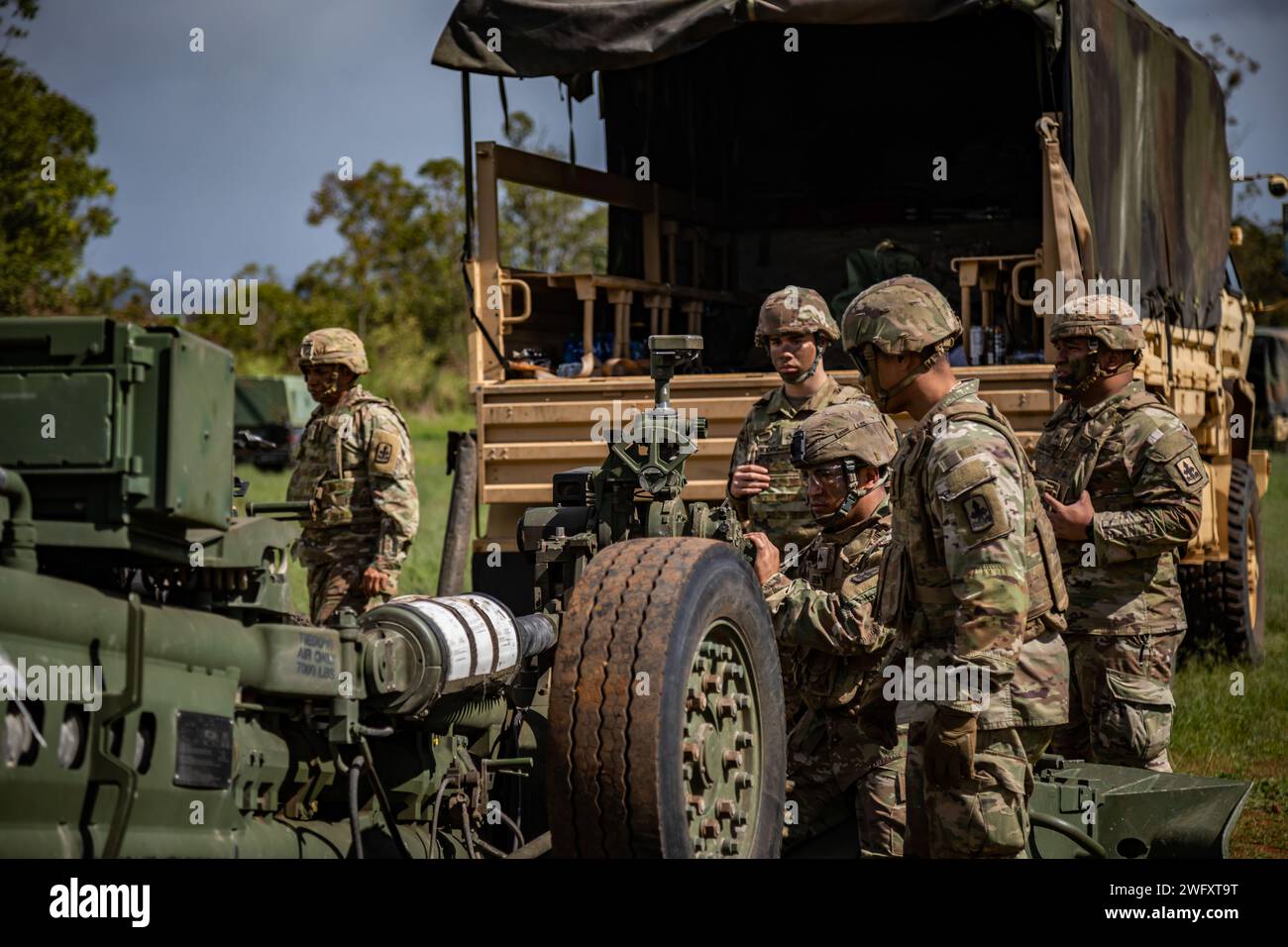 U.S. Soldiers assigned to Charlie Company, 1st Battalion, 487th Field Artillery Regiment (1-487 FA), 29th Brigade Support Battalion, Hawaii Army National Guard conduct fire support certification at Schofield Barracks, Hawaii, Jan. 6, 2024. Soldiers conduct certification on various weapon platforms to maintain proficiency to validate combat capabilities and readiness. Stock Photo