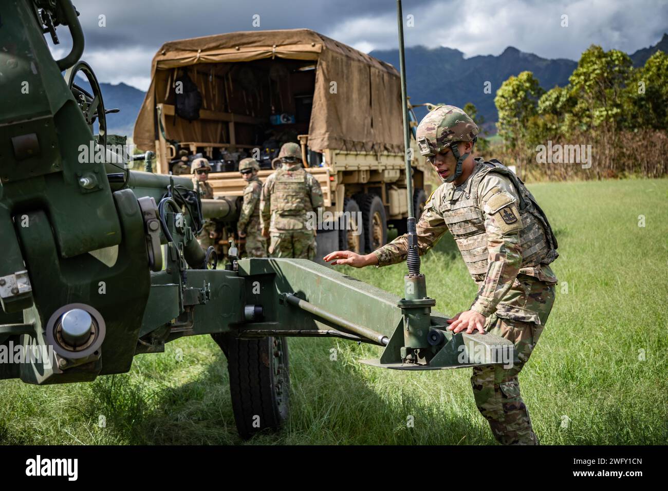 U.S. Soldiers assigned to Charlie Company, 1st Battalion, 487th Field Artillery Regiment (1-487 FA), 29th Brigade Support Battalion, Hawaii Army National Guard conduct fire support certification at Schofield Barracks, Hawaii, Jan. 6, 2024. Soldiers conduct certification on various weapon platforms to maintain proficiency to validate combat capabilities and readiness. Stock Photo