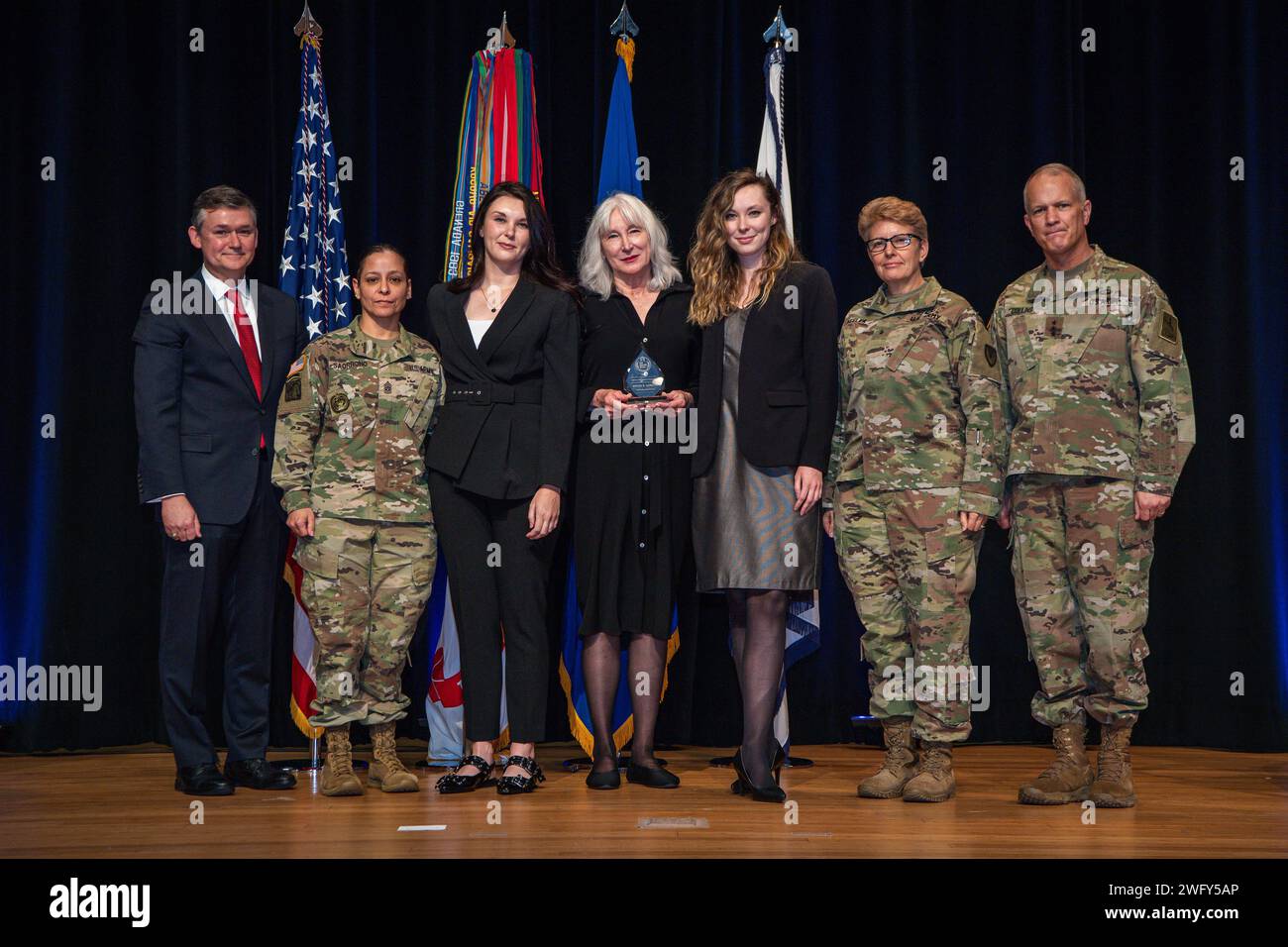 Douglas Bush, left, presents the Army Acquisition Executive’s ...