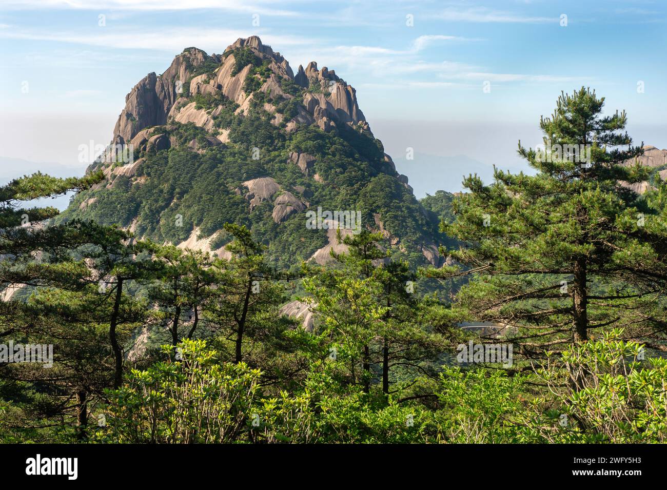 Lotus Peak, also known as Lianhua Feng, stands at 6,115 feet as the tallest summit in the Huangshan mountain range in China. The peak has been referen Stock Photo