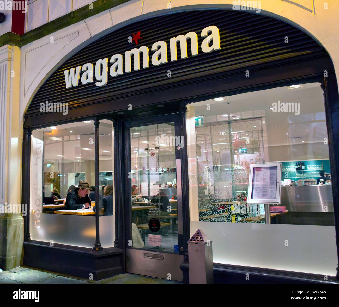 Diners,People Eating,out,Wagamama,Japanese,Restaurant,Canterbury,Kent Stock Photo