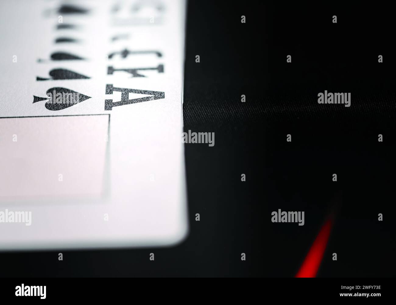 This image captures a close-up shot of an ace of spades playing card ...