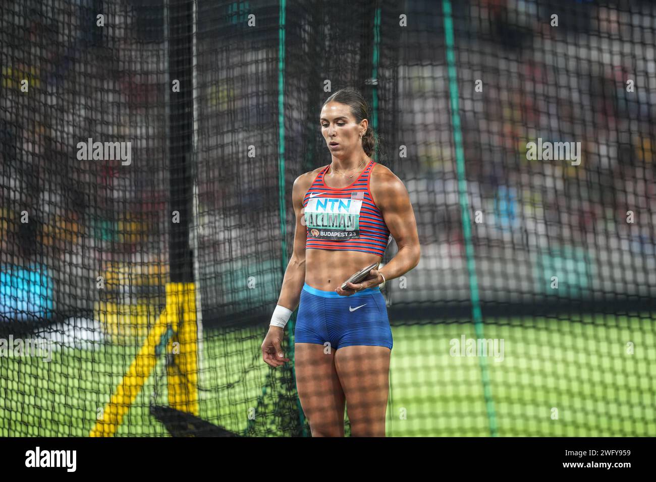 Valarie ALLMAN celebrating his medal with the flag in the Budapest 2023 World Athletics Championships. Stock Photo