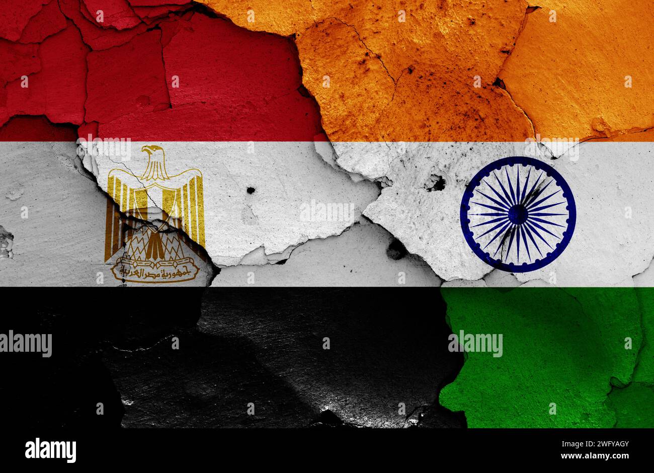 flags of Egypt and India painted on cracked wall Stock Photo