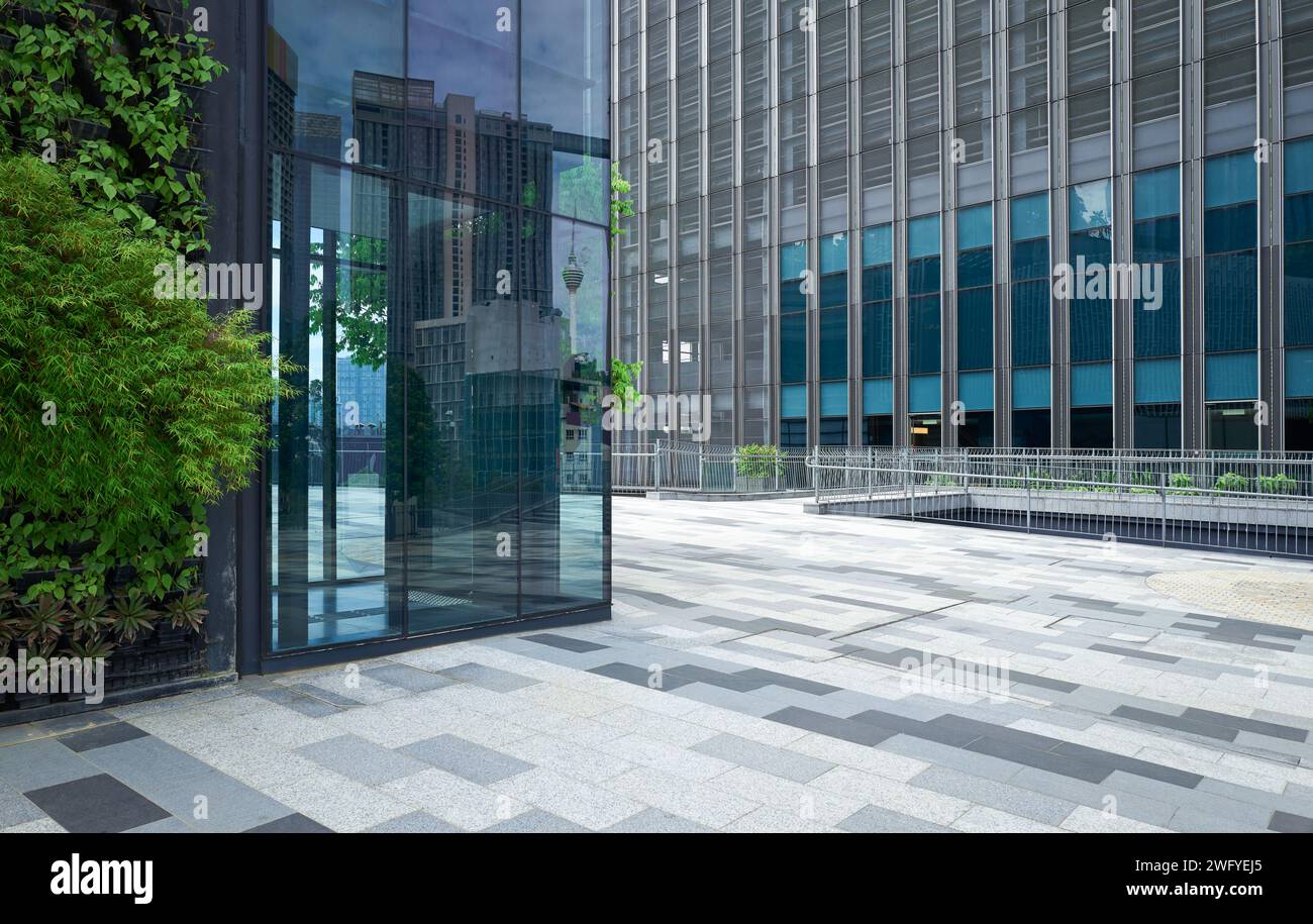 Modern business center glass wall and green decoration Stock Photo