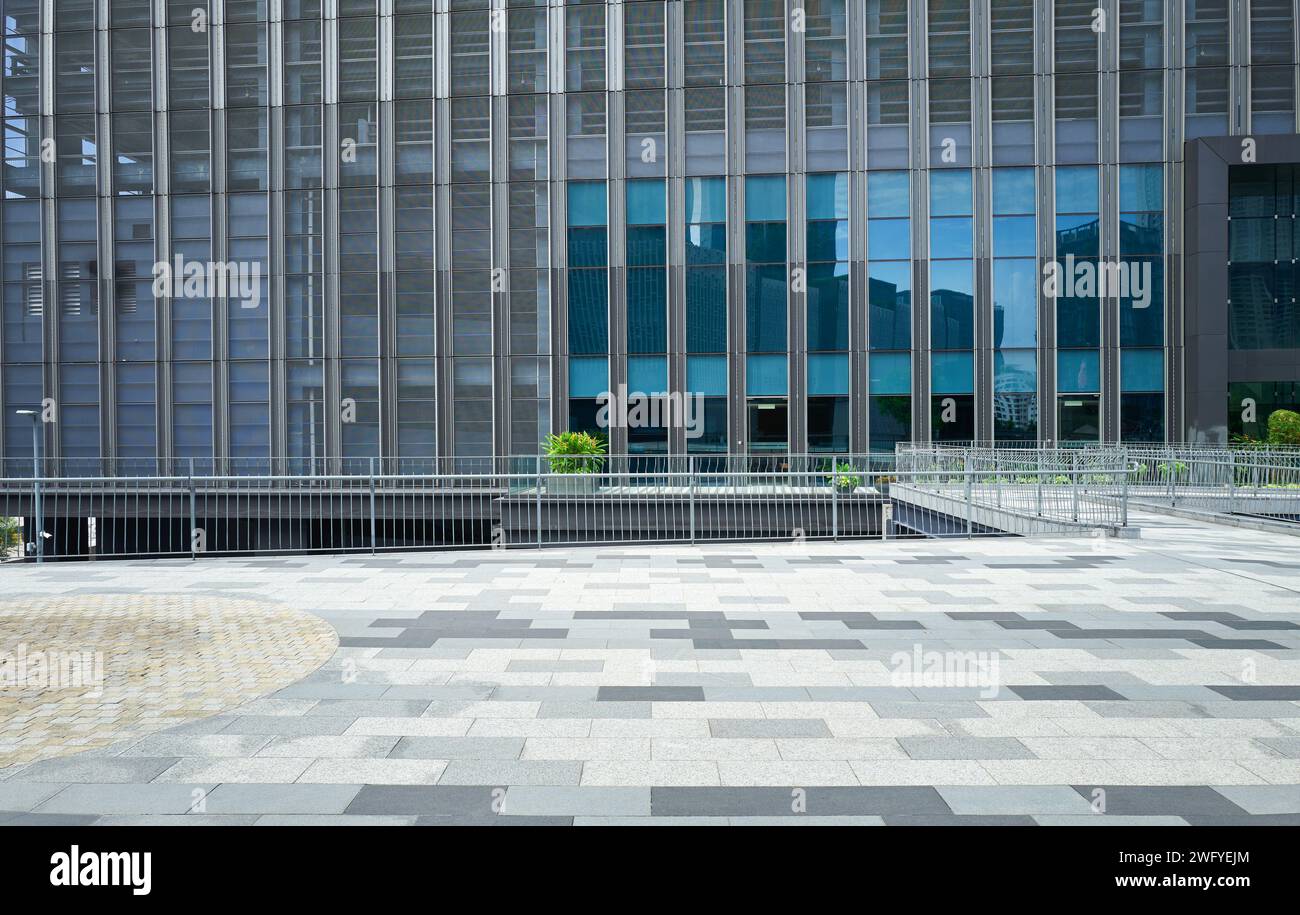 Empty tiles floor with modern business building Stock Photo