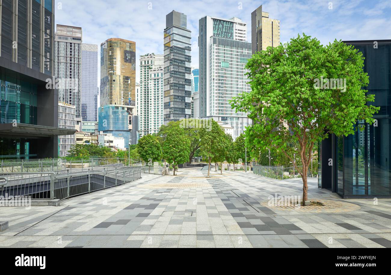 Modern commercial buildings with empty floors and tress at Kuala Lumpur, Malaysia Stock Photo