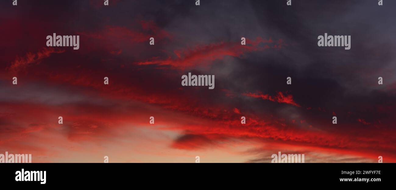Panoramic dusk cloudscape, colorful clouds. Stock Photo