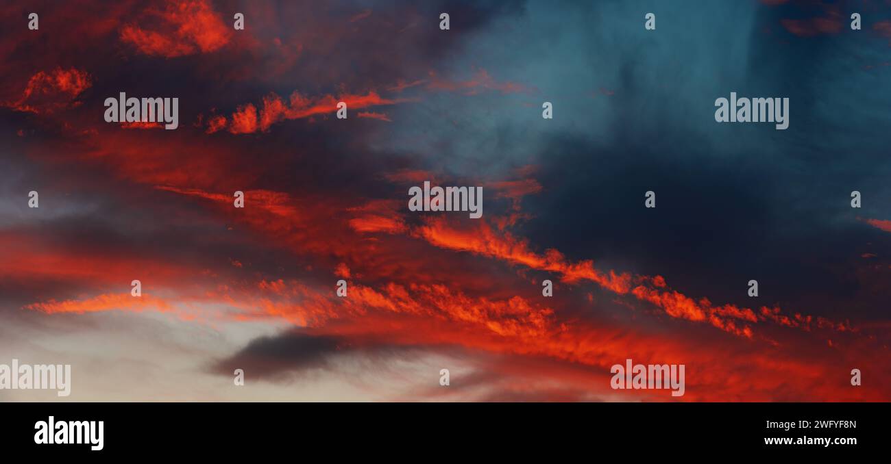 Panoramic dusk cloudscape, colorful clouds. Stock Photo