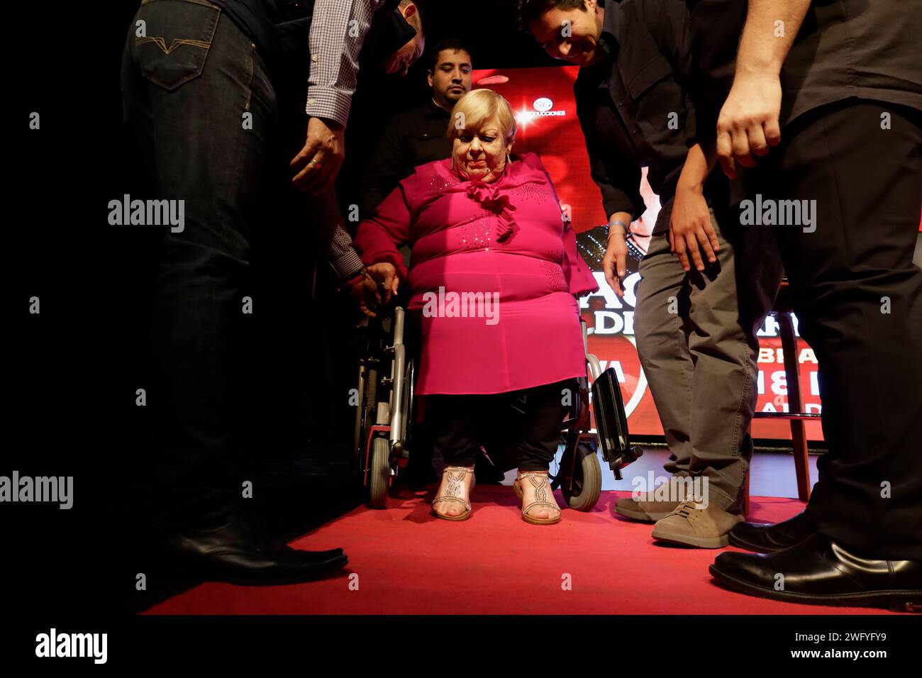 Mexico City, Mexico. 01st Feb, 2024. Paquita La Del Barrio, a Mexican ranchero singer and advocate for women's rights, is being helped into a wheelchair at the conclusion of a press conference at the Lunario of the National Auditorium in Mexico City. She is announcing an upcoming concert featuring members of La Sonora Santanera and Maria Fernanda in celebration of the Day of Love and Friendship. (Photo by Gerardo Vieyra/NurPhoto)0 Credit: NurPhoto SRL/Alamy Live News Stock Photo