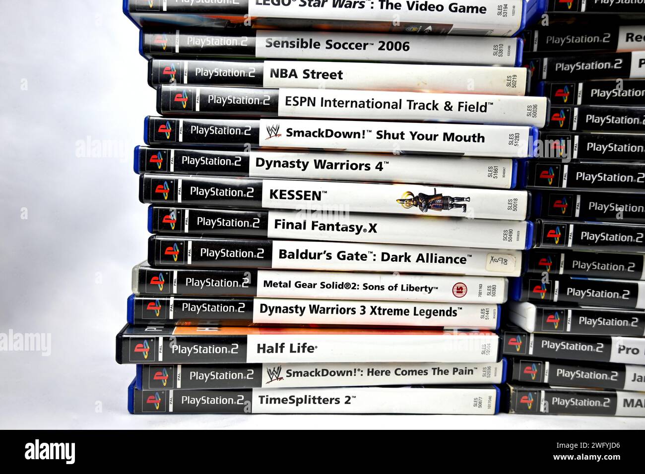 Playstation 2 PS2 video games stacked pile – Wales, UK  –  31 January 2024 Stock Photo