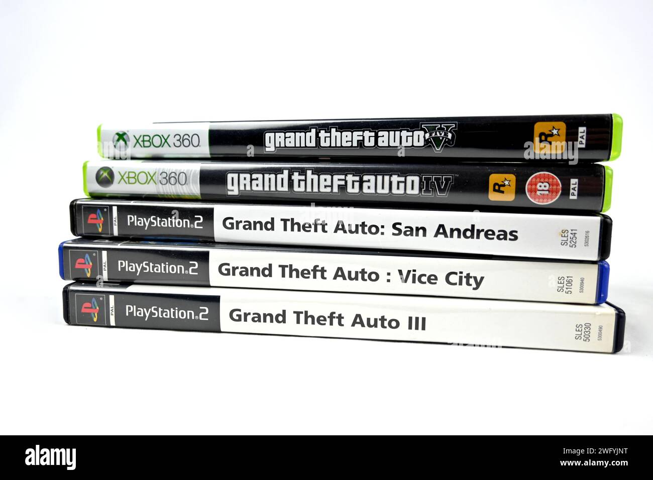 GTA Grand Theft Auto game series stacked pile on playstation 2 and xbox 360 – Wales, UK  –  31 January 2024 Stock Photo