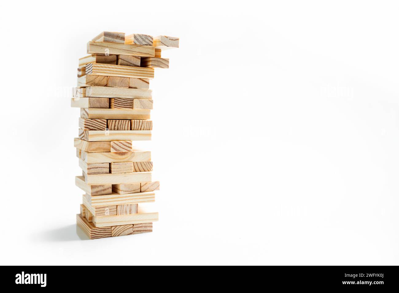 Closeup view of the tower of the wooden block on a white background. Jenga tower Stock Photo