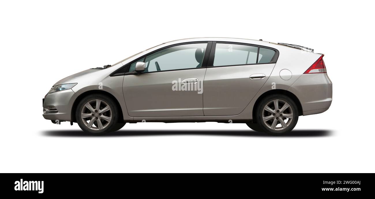 Honda Insight hybrid electric car, side view isolated on white background Stock Photo