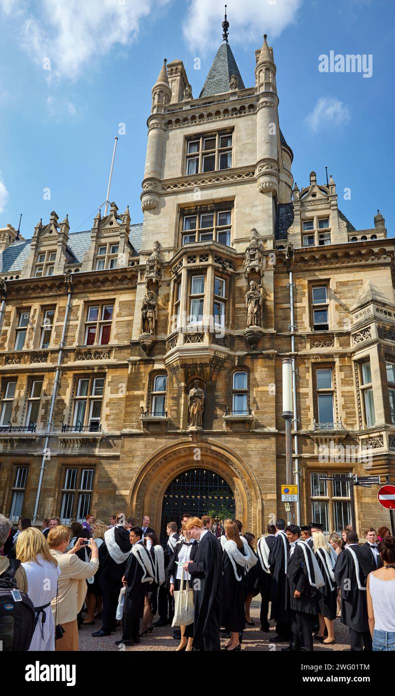 Cambridge, United Kingdom - June 26, 2010: University graduates in front of Gonville and Caius College (Caius), one of the oldest colleges of Cambridg Stock Photo