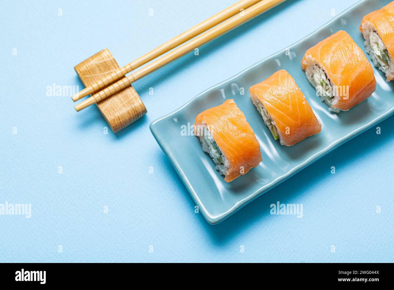 Sushi With Salmon On Blue Rectangular Plate Stock Photo