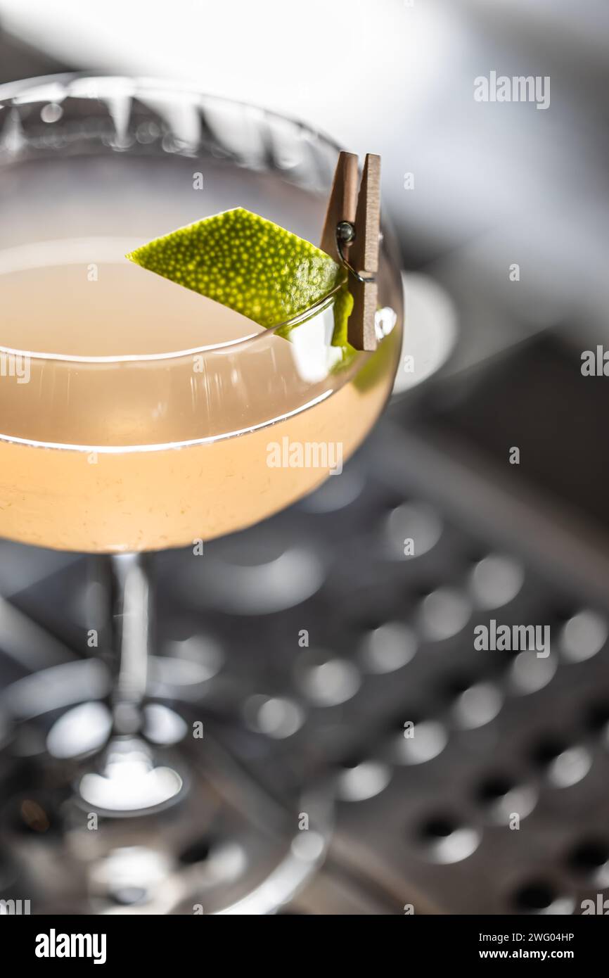 Exotic cocktail drink Daiquiri Twis on the bar counter in the pub Stock