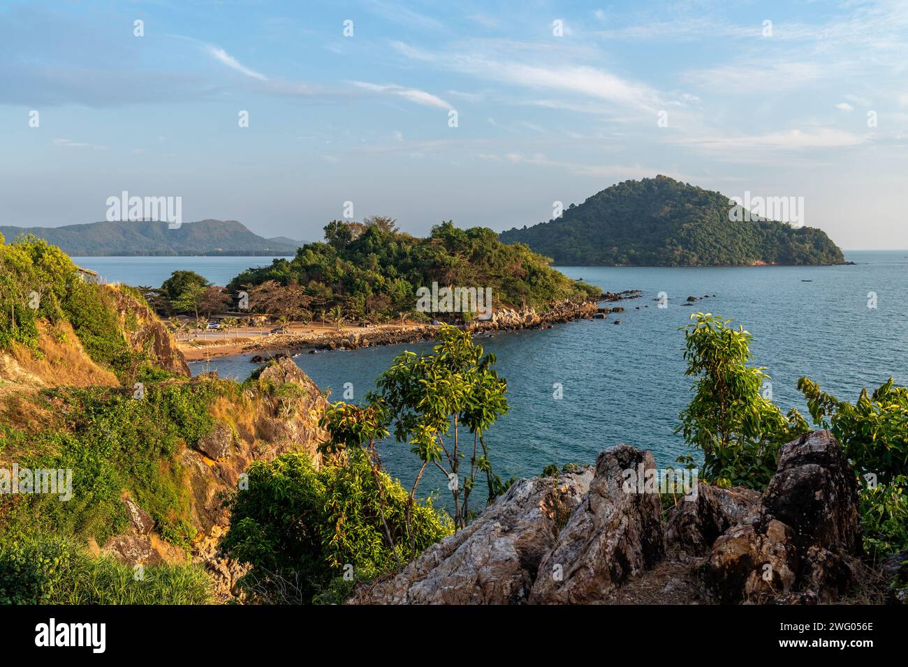 Beautiful view of evening sunset at the Noen Nangphaya view point looking out to the ocean and distant islands in Chonburi, Thailand Stock Photo