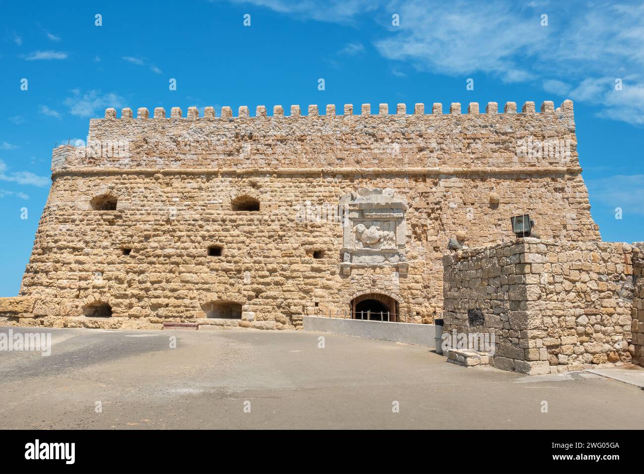 Front view to Koules Fortress (Castello a Mare) in old Venetian harbour. Heraklion, Crete, Greece Stock Photo