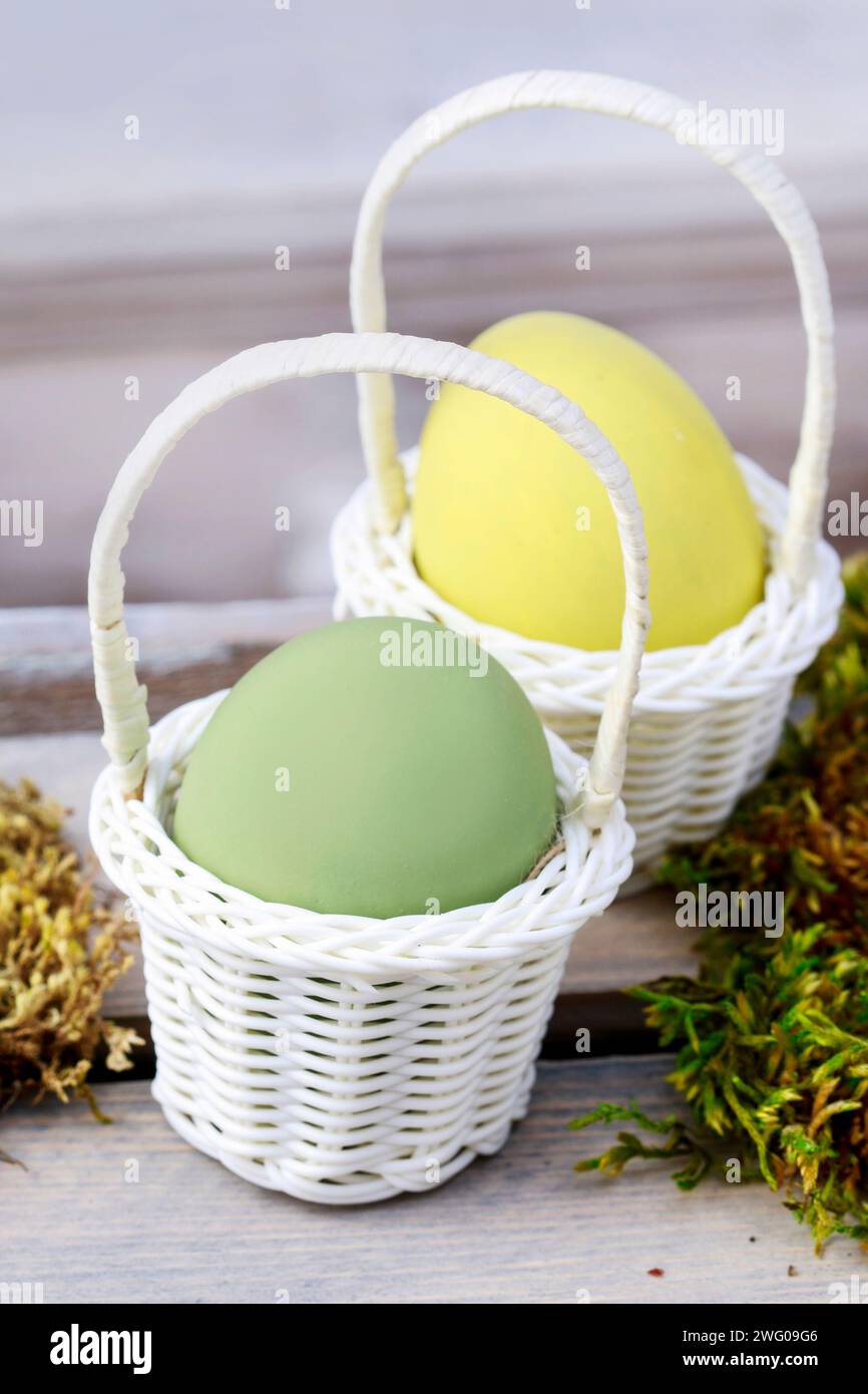 Eggs in wicker baskets, easter decoration Stock Photo