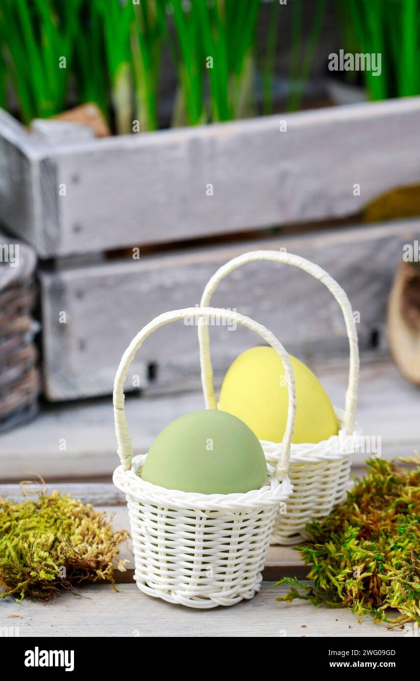 Eggs in wicker baskets, easter decoration Stock Photo