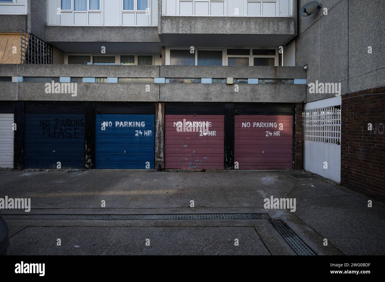 Garages on the Lesnes Estate in Thamesmead, London SE2 Built 1967 by Cubitts, architect Robert Rigg Stock Photo