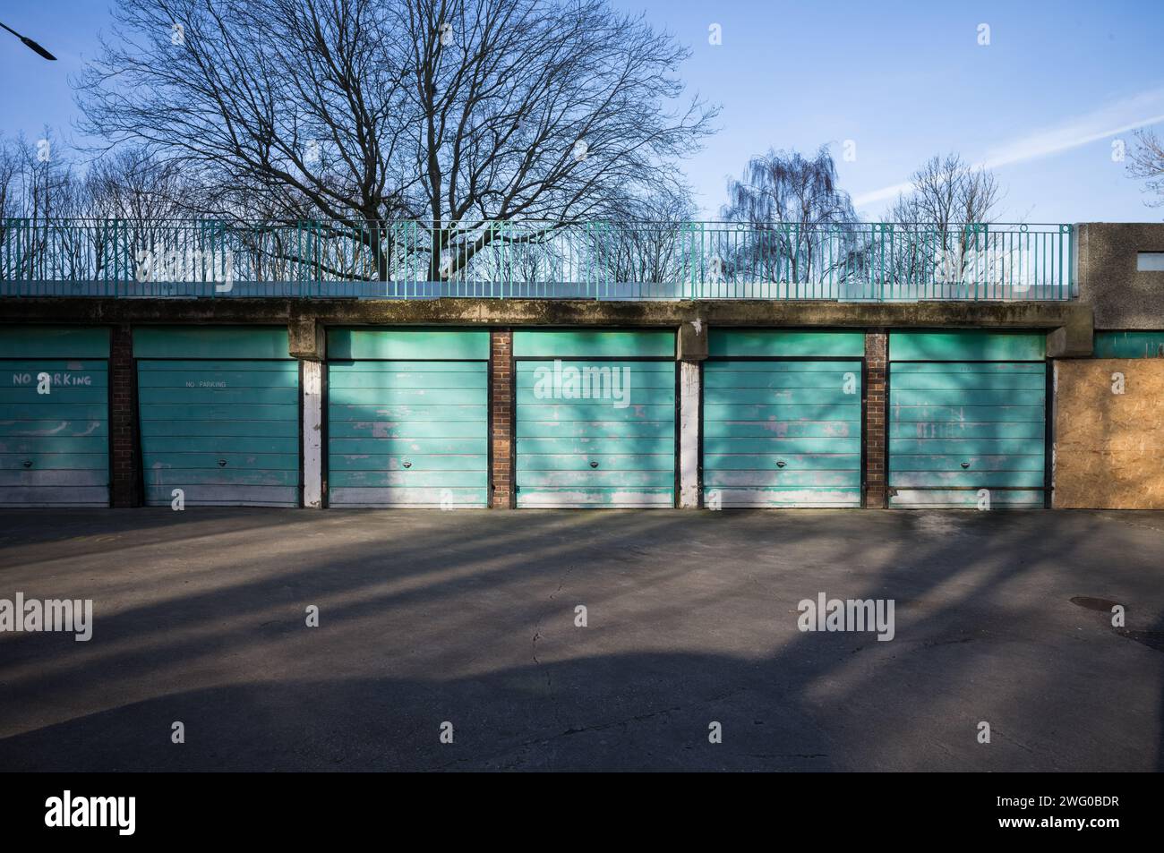 Garages on the Lesnes Estate in Thamesmead, London SE2 Built 1967 by Cubitts, architect Robert Rigg Stock Photo