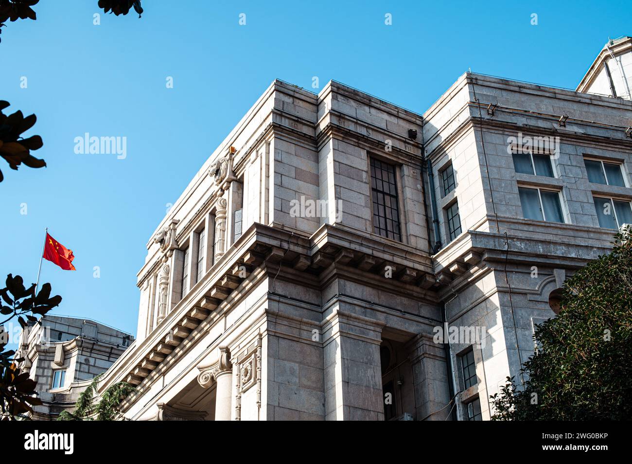 Government office building with flag waving on facade, Wuhan, China ...