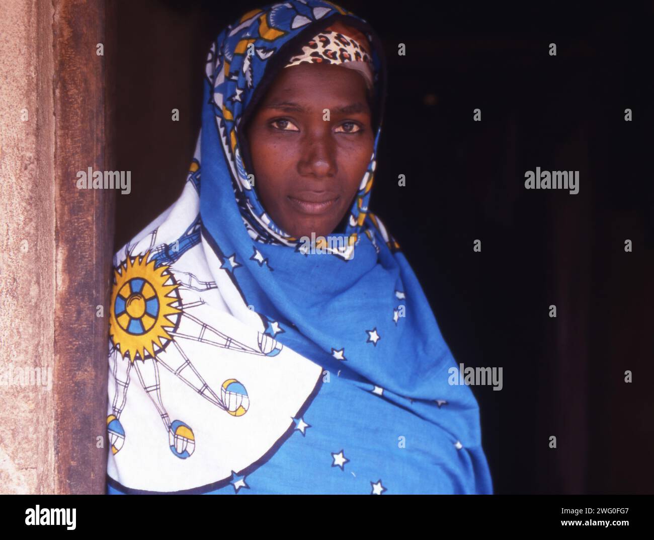 Portrait of a village woman wearing the traditional Khanga, Zanzibar, Tanzania. Stock Photo