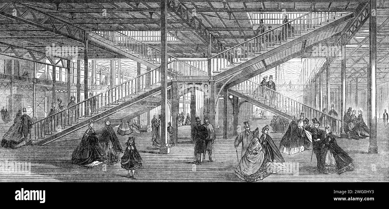 Progress of the International Exhibition Building: the stairs, 1862. Engraving showing '...a section of the building in which is a staircase leading from the basement to the galleries. The sketch faithfully represents the character of the staircases, and the glimpse which it gives of the area of the building enables an idea to be formed of its general appearance'. The International Exhibition of 1862 was a world's fair held from 1 May to 1 November 1862 in South Kensington, London. The site now houses museums including the Natural History Museum and the Science Museum. From &quot;Illustrated L Stock Photo