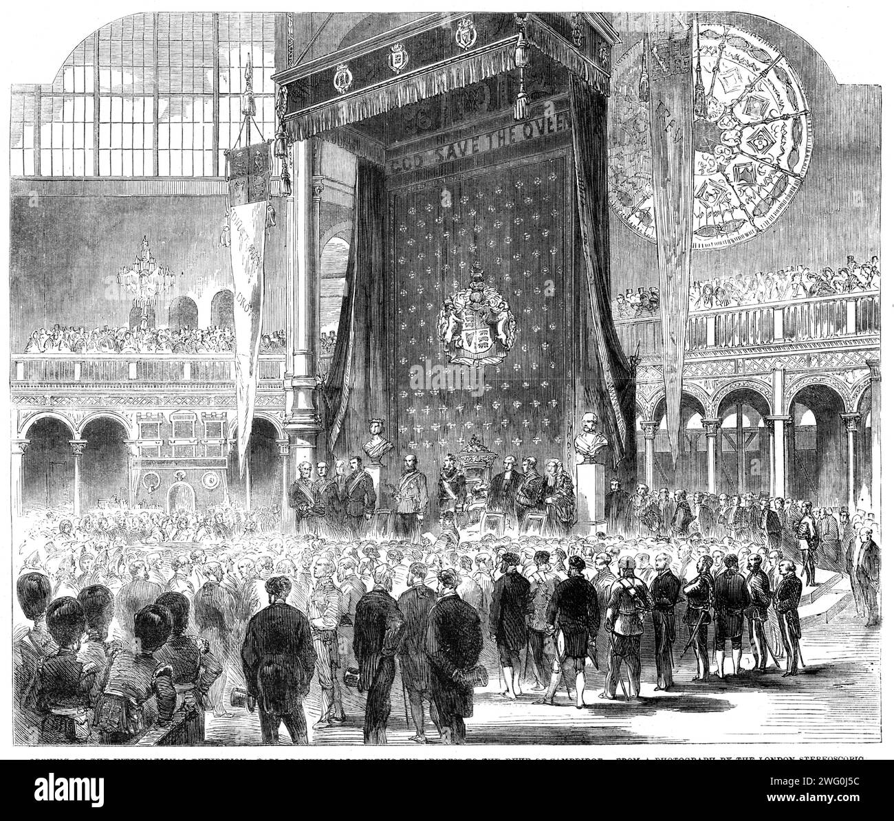 Opening of the International Exhibition: Earl Granville presenting the address to the Duke of Cambridge - from a photograph by the London Stereoscopic Company, 1862. '...a richly-ornamented throne had been erected, in front of which gilded chairs were placed for the Queen's commissioners. In the central place is the Duke of Cambridge; on his right, the Crown Prince of Prussia, the Archbishop of Canterbury, and the Earl of Derby; on his left are Prince Oscar of Sweden, the Lord Chamberlain, Viscount Palmerston, and the Speaker of the House of Commons...at the foot of the dais...stood the Royal Stock Photo