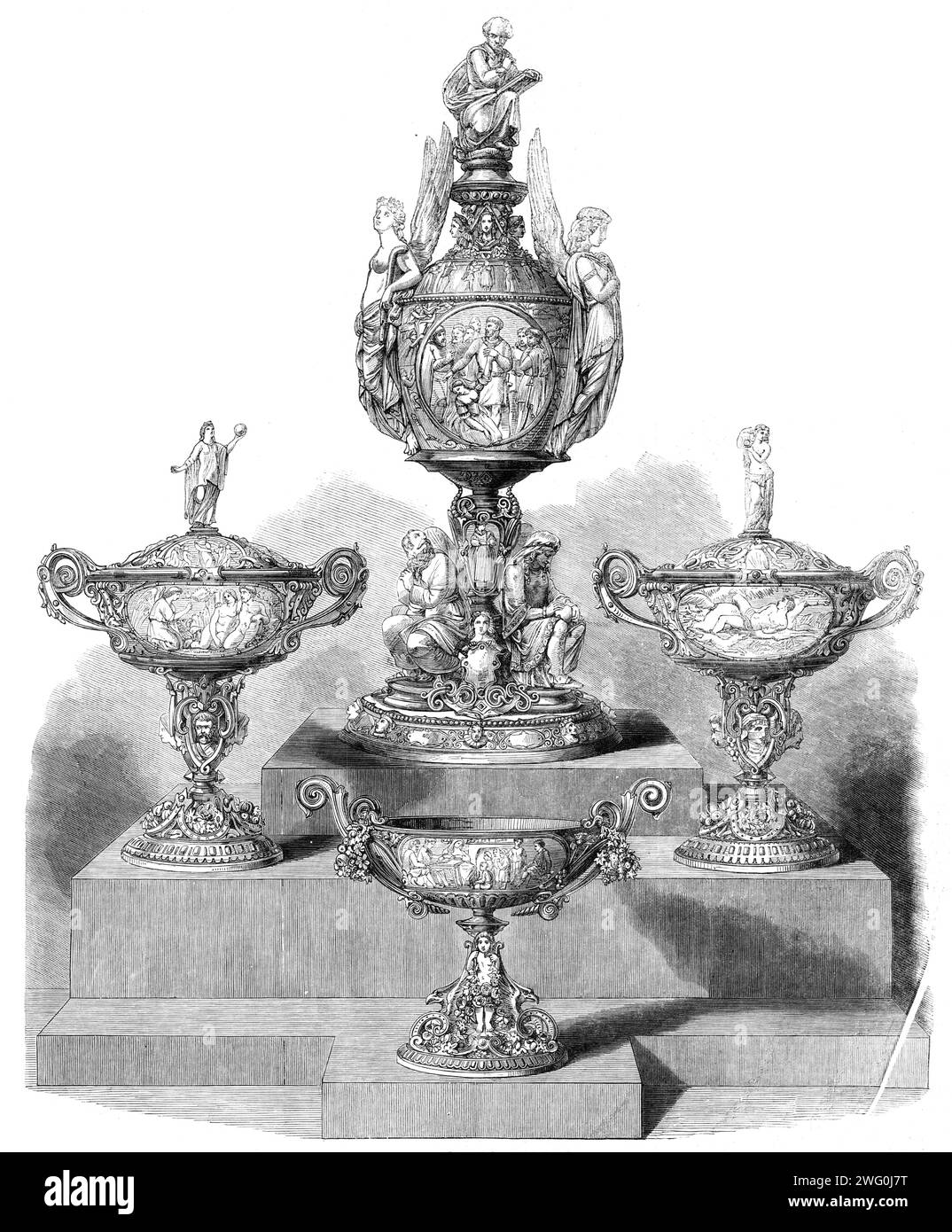 The International Exhibition: &quot;The Poetry of Great Britain&quot;, a group of silver designed and modelled by Signor Monti and executed by Mr. C. F. Hancock, 1862. 'The name of Mr. Hancock as an enterprising and discriminating employer of the best artistic talent obtainable has long been favourably known to us; but we think he has seldom been more fortunate than in obtaining the services of Signor Monti in designing and modelling these important works, on which are delineated scenes from some of the greatest of the English poets in a manner not unworthy of the source which inspired them. T Stock Photo