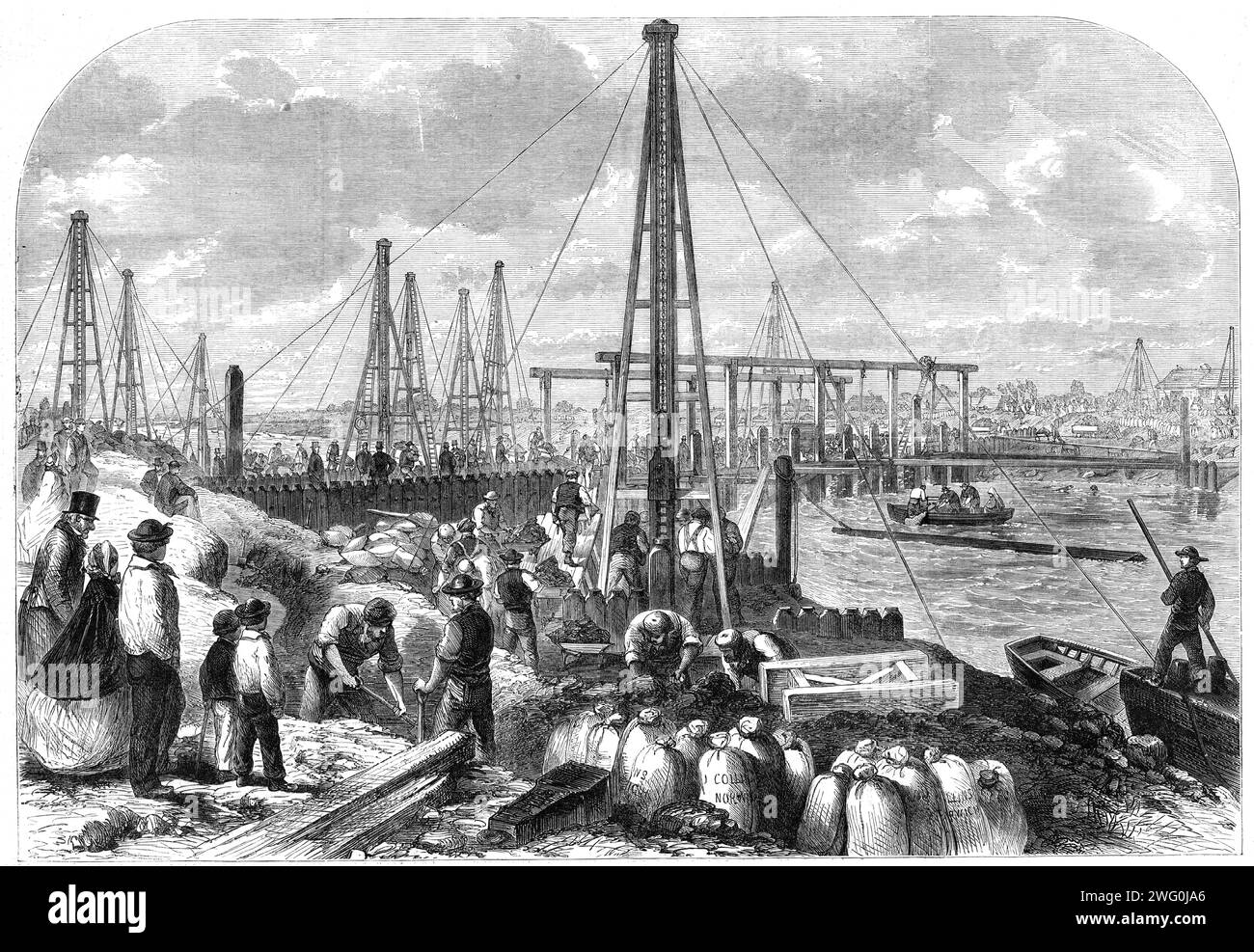 The Flood in the Fens: making the cofferdam, 1862. 'The hopes, mingled largely with fears, of the Marshland farmers are centred upon the gigantic cofferdam which Mr. Leather, the contractor, has pushed across the Middle-Level Drain, about half a mile above the blown-up sluice. The framework of this dam consists of a great number of piles...which are driven to a depth of twenty feet in the earth. All these piles are girded together by iron bolts fixed into the bed of the river by expert divers...The banks were lined with sacks of clay to the number of many thousands, and bodies of men were enga Stock Photo