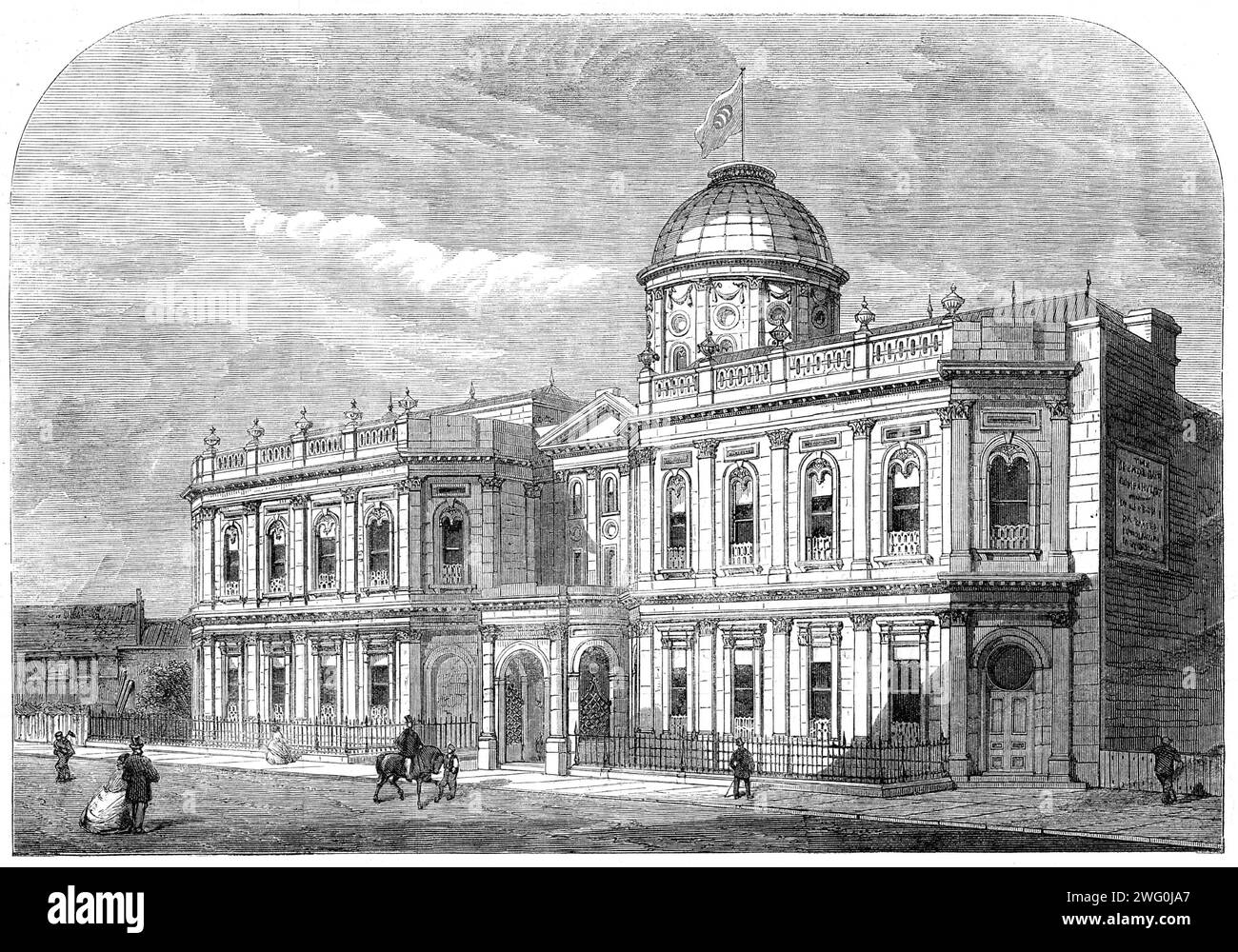 The Oriental Baths, Victoria-Street, Westminster, 1862. View of '...the handsome and extensive building...for the purpose of extending to England the benefits of that great sanitary institution, the Turkish Bath...The ceilings of [the hotrooms] are at once lighted and decorated by means of stained-glass stars of different sizes, in primitive colours. The ornamental stucco and terra-cotta work in these apartments is very elaborate and effective; the centre screens, diaper-walls, and arches leading to the fountain or douching rooms are all finished in terra-cotta...The lavatories are elegantly o Stock Photo