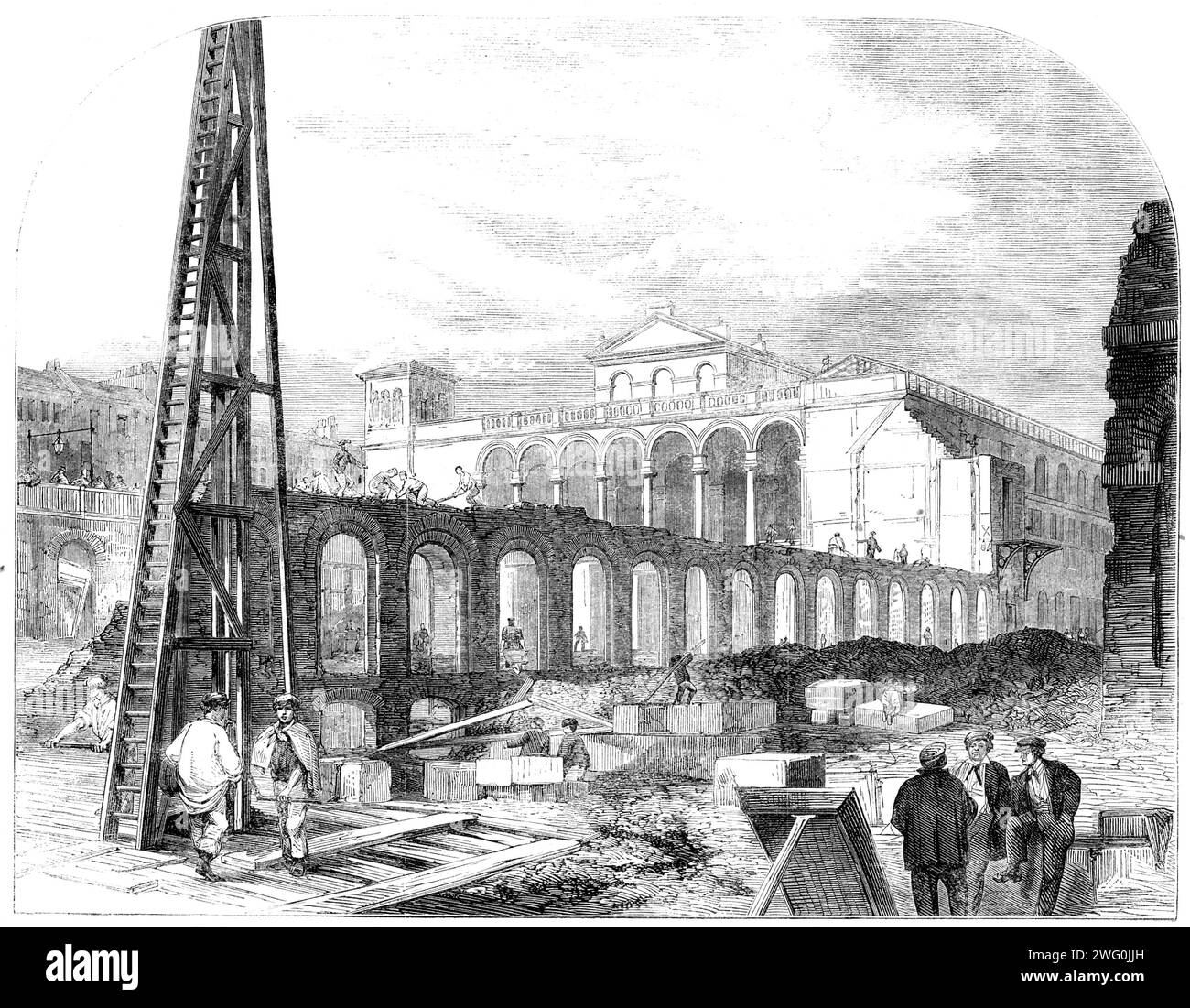 Demolition of Hungerford Market to make room for the Charing-Cross Railway Station, [London], 1862. 'Our View is taken from the lower end of Villiers-street, where access is at present obtainable to the steam-boat pier. These ruins present a singular aspect: fragments of brickwork, half-opened vaults, with here and there broken flights of stairs leading to them, and prostrate pillars, give one the notion of a young earthquake having been at play here. The works of the new railway-bridge are so rapidly approaching the shore as to call for the immediate destruction of the market. The first porti Stock Photo