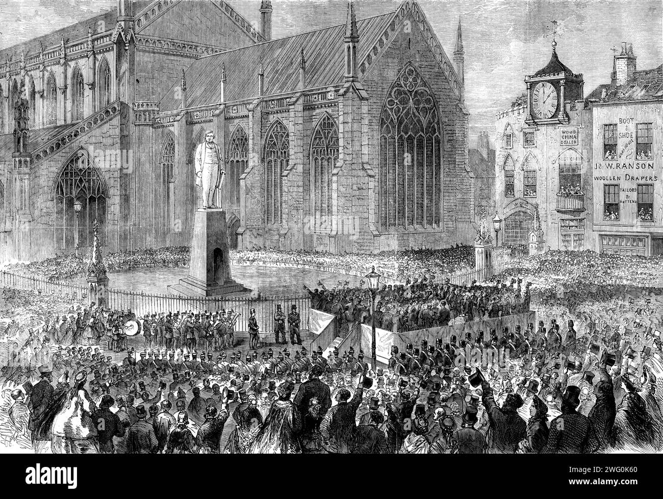 Inauguration of the memorial statue to Mr. Herbert Ingram, M.P., in the Market-Place, Boston, [in Lincolnshire], 1862. View of the '...ceremony of uncovering the Ingram Memorial Statue, from photographs by Mr. E. Hackford...The statue stands...within the shadow of the fine old church...Boston kept high holiday...most of the shops were closed, whilst the windows of the houses were thronged by eager spectators. The...committee and invited guests met the local authorities at the Assembly Rooms, and walked thence, in procession to the site of the statue. In the Marketplace had been erected a platf Stock Photo
